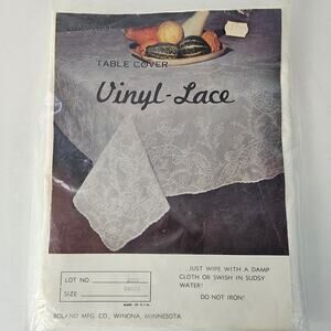Vintage vinyl off white lace tablecloth new in package 54 x 72